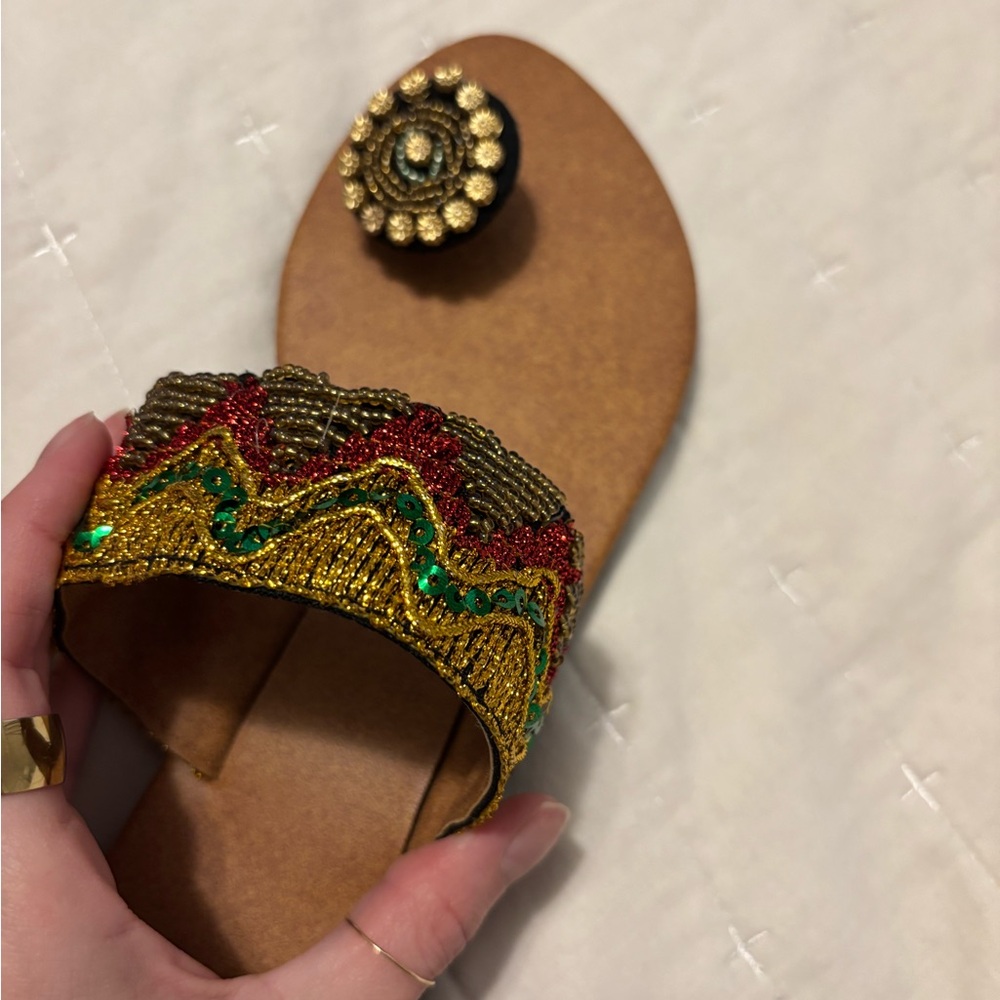 Handmade sandals from a boutique in Bali, Indonesia — one of a kind. Never worn.